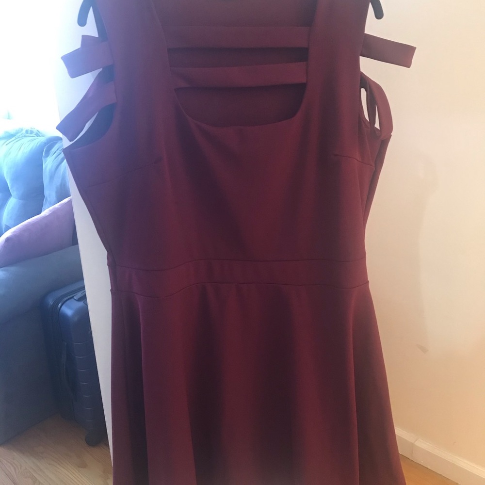 Wine colored dress with arm and neck detail